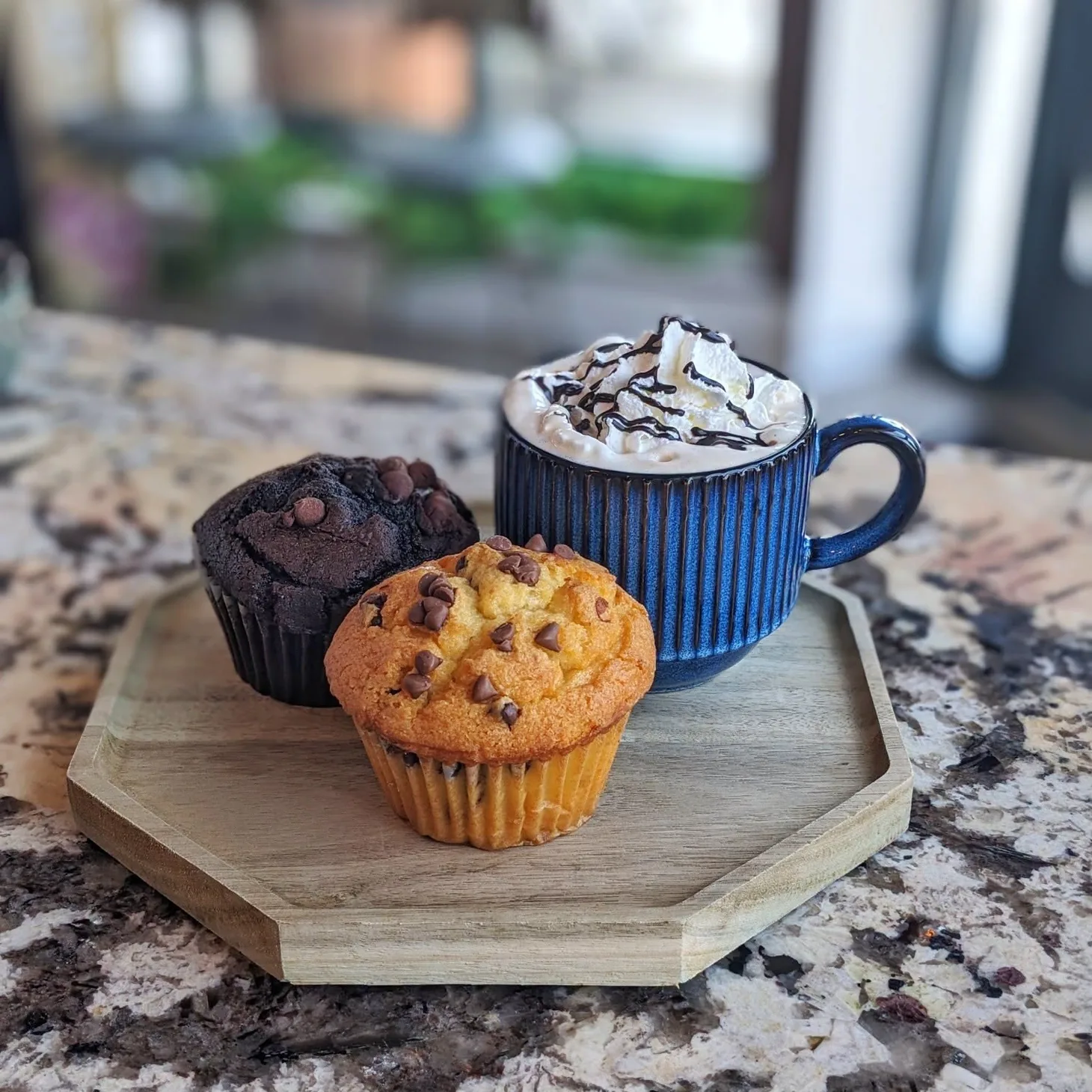 Hot chocolate and freshly baked muffins served at Corner Grounds Café